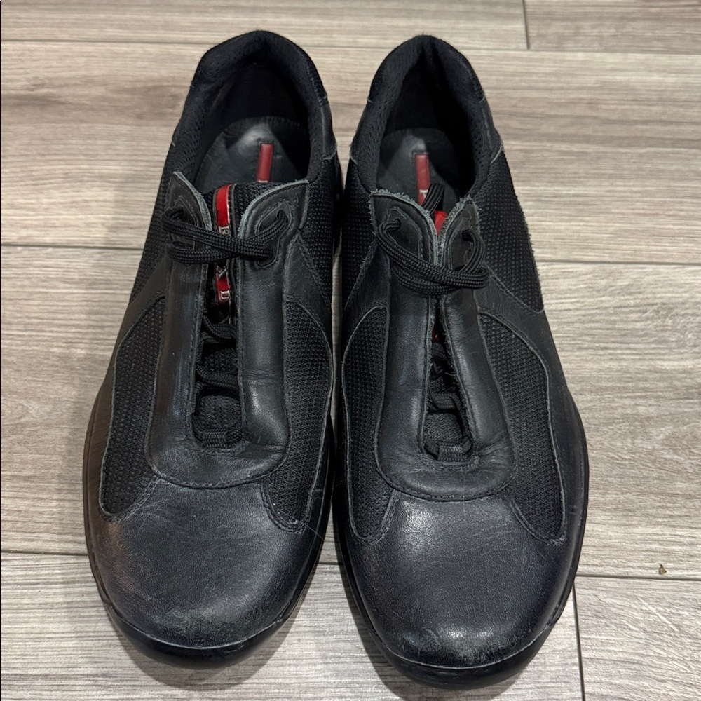 Prada Black Leather Sneakers with Red Logo